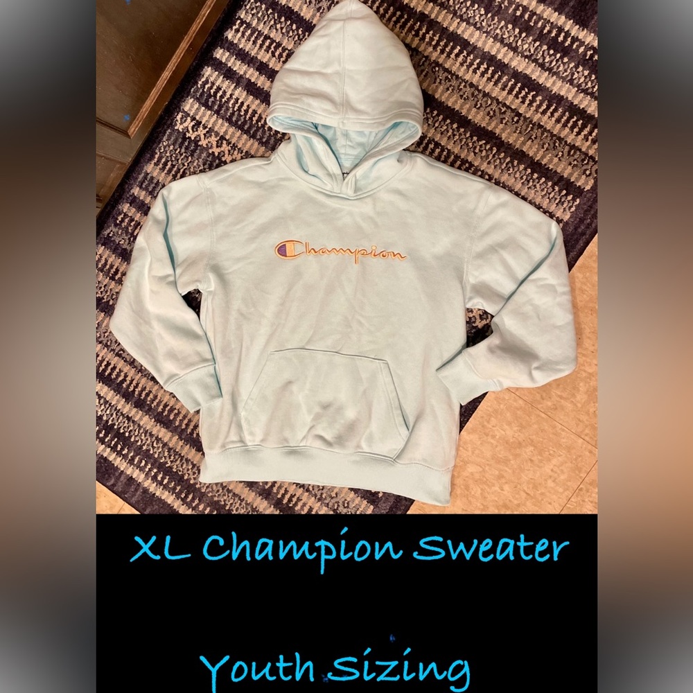 This is a light blue Youth XL hoodie sweatshirt and is in great condition:)